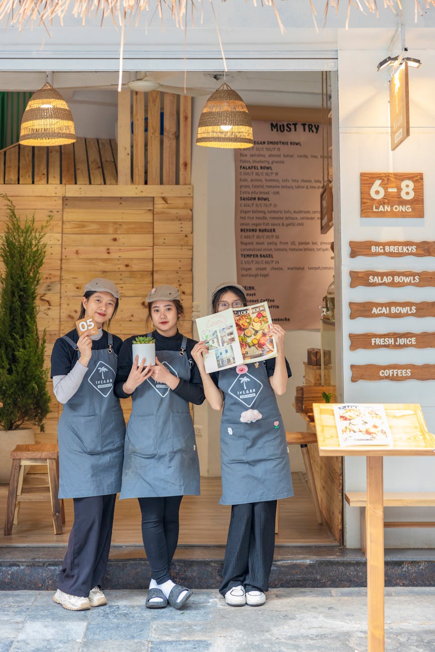 cooks with aprons promoting restaurant
