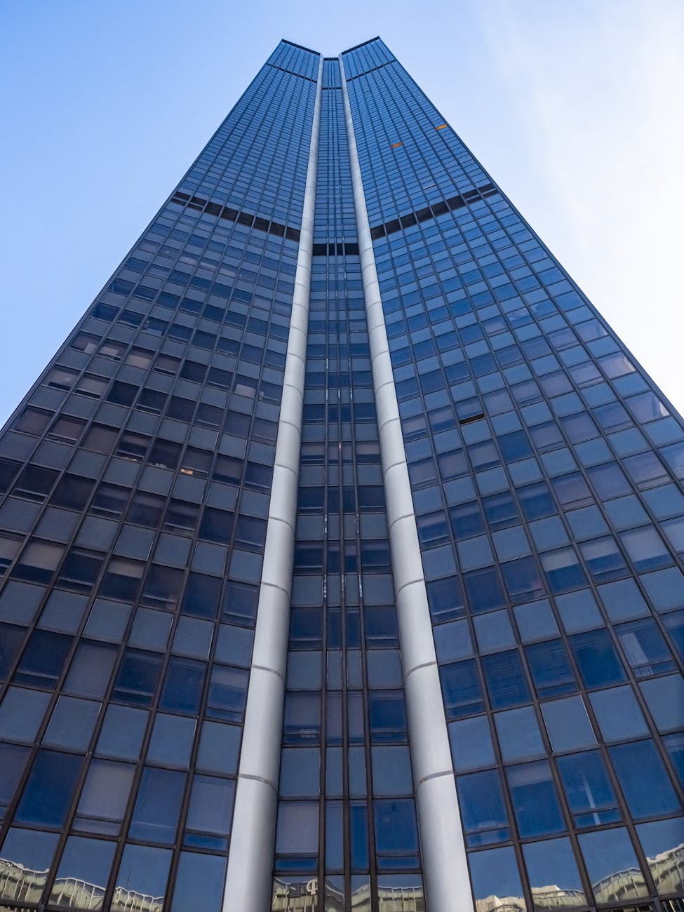 modern high rise skyscraper against blue sky